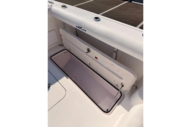 Slide: The Image of Open storage compartment on 2007 Pro-Line 32 Express boat deck. - 42
