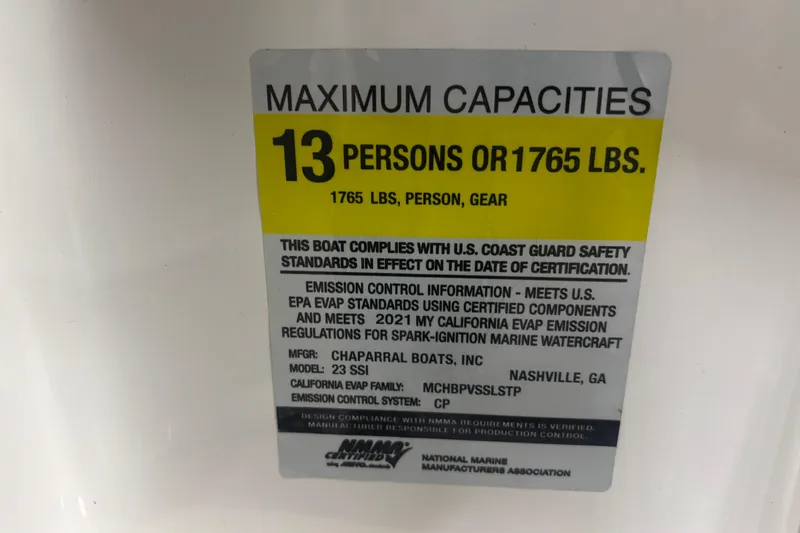 Slide: The Image of Capacity label for 2021 Chaparral 23 SSi boat, max 13 persons or 1765 lbs. - 13