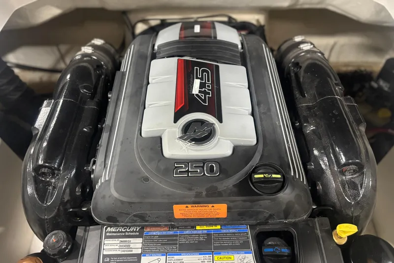 Slide: The Image of Engine of 2021 Chaparral 23 SSi boat, featuring Mercury 4.5L 250 horsepower. - 14