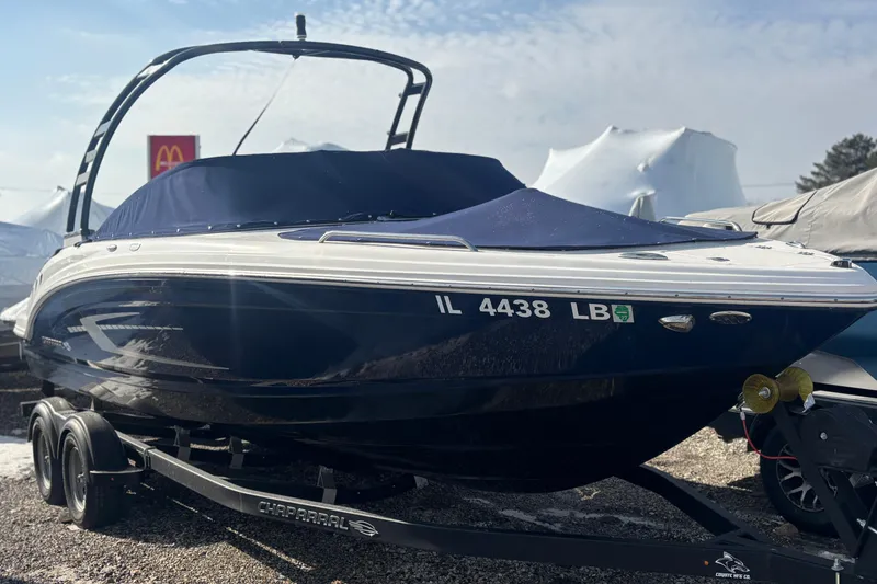 Slide: The Image of 2021 Chaparral 23 SSi boat on trailer, covered and parked outdoors. - 4