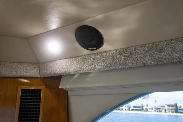 Slide: The Image of Interior of 2003 Riviera 4700 Sport Yacht with speaker and light fixture. - 54