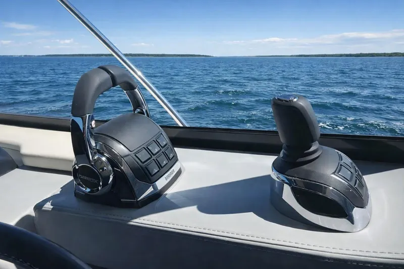 Slide: The Image of 2019 Regal 42 Grande Coupe controls with ocean view in background. - 11