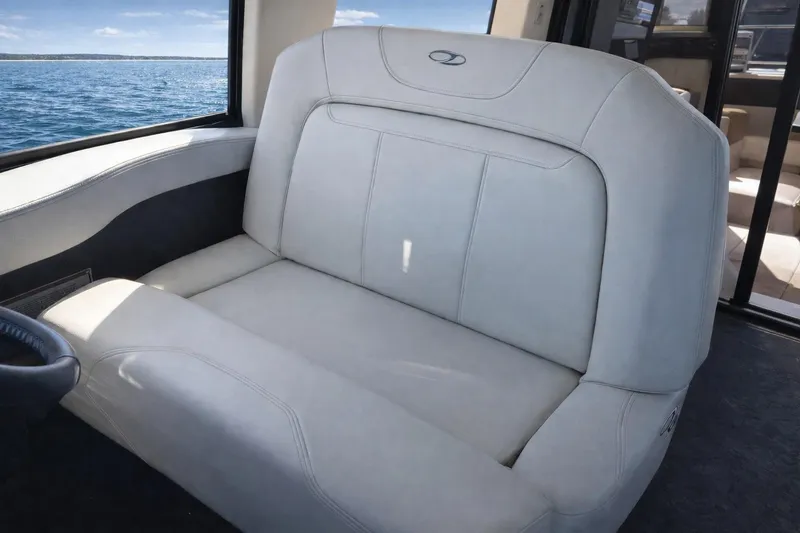 Slide: The Image of Luxurious seating inside 2019 Regal 42 Grande Coupe yacht with ocean view. - 12