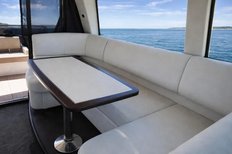 Slide: The Image of Luxurious interior of 2019 Regal 42 Grande Coupe yacht with ocean view. - 13