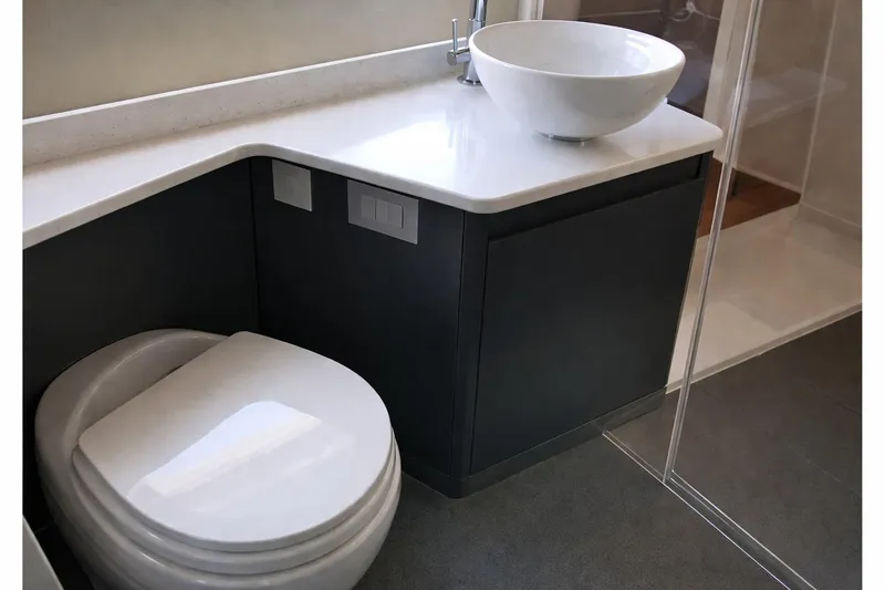 Slide: The Image of Luxurious bathroom in 2019 Regal 42 Grande Coupe yacht with modern fixtures. - 17