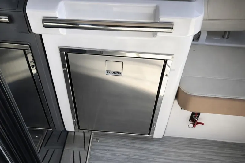 Slide: The Image of 2019 Regal 42 Grande Coupe interior with Isotherm stainless steel fridge. - 6