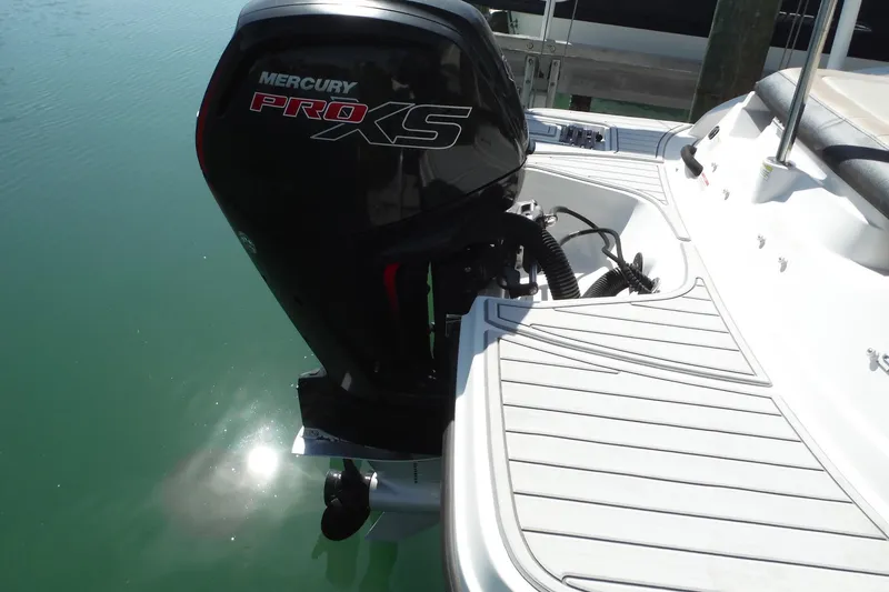 Slide: The Image of 2021 Sea Ray SPX 190 Outboard with Mercury Pro XS engine on calm water. - 14