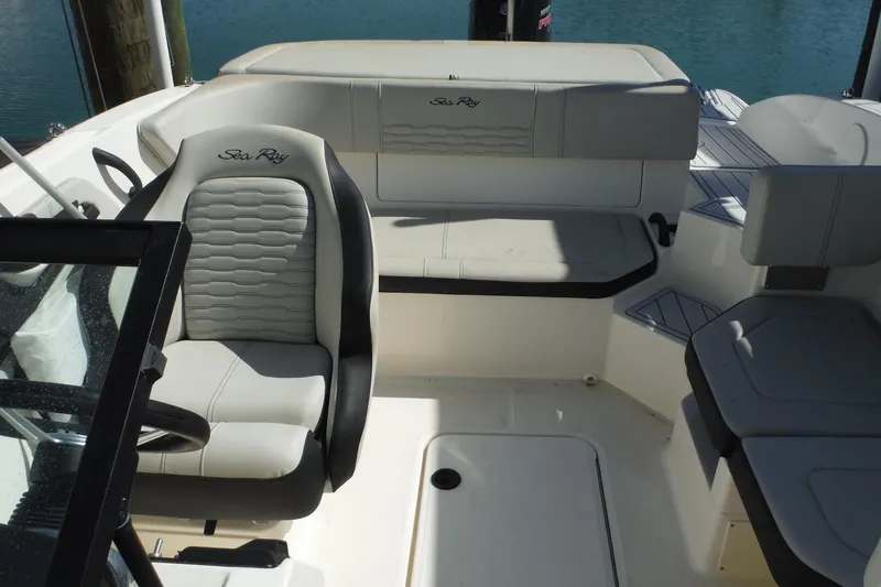 Slide: The Image of Interior of 2021 Sea Ray SPX 190 Outboard boat with seating and steering wheel. - 18