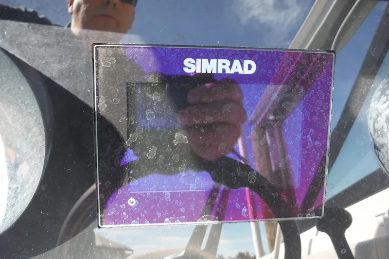 Slide: The Image of Simrad display on 2021 Sea Ray SPX 190 Outboard boat dashboard. - 22