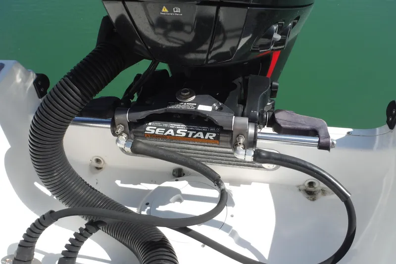 Slide: The Image of 2021 Sea Ray SPX 190 Outboard engine with SeaStar hydraulic steering system. - 30