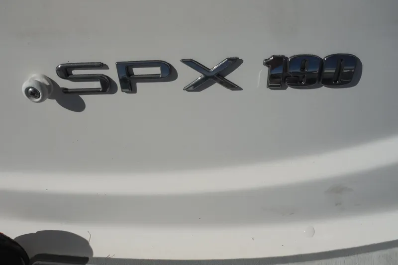 Slide: The Image of 2021 Sea Ray SPX 190 Outboard logo on white surface. - 35