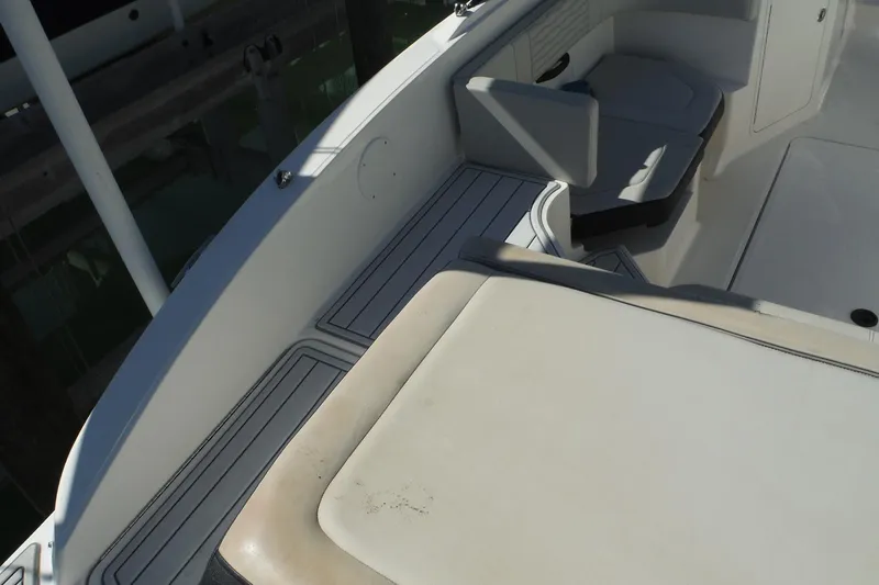 Slide: The Image of 2021 Sea Ray SPX 190 Outboard boat interior with seating and deck details. - 37