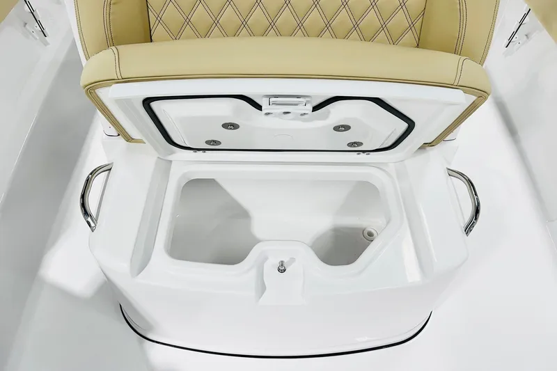 Slide: The Image of 2026 Sportsman Masters 267 Bay Boat seat with integrated storage compartment. - 9