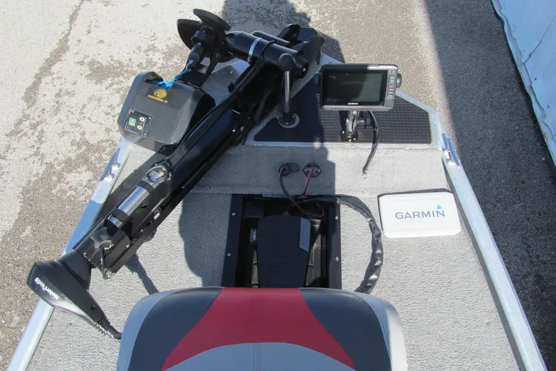 Slide: The Image of 2010 Tracker Pro 16 boat with Garmin fishfinder and trolling motor on deck. - 8