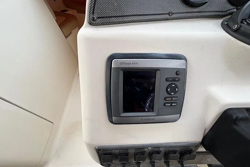 Slide: The Image of Garmin GPSmap 441s on 2007 Scout 222 Dorado boat dashboard. - 16