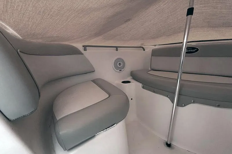 Slide: The Image of Interior of 2007 Scout 222 Dorado boat with gray seating and speaker. - 20