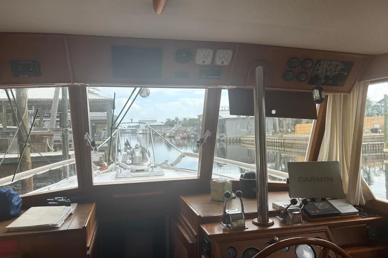 Slide: The Image of Interior view of 1996 Grand Banks 36 Motoryacht helm with navigation equipment. - 14