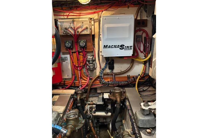 Slide: The Image of Engine room of 1996 Grand Banks 36 Motoryacht with electrical components and wiring. - 27