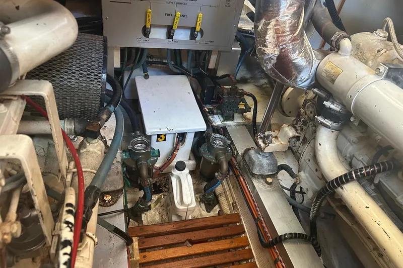 Slide: The Image of Engine room of 1996 Grand Banks 36 Motoryacht with visible fuel panel and components. - 36