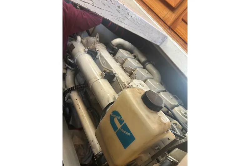 Slide: The Image of Engine compartment of 1996 Grand Banks 36 Motoryacht with Cummins Marine components. - 39