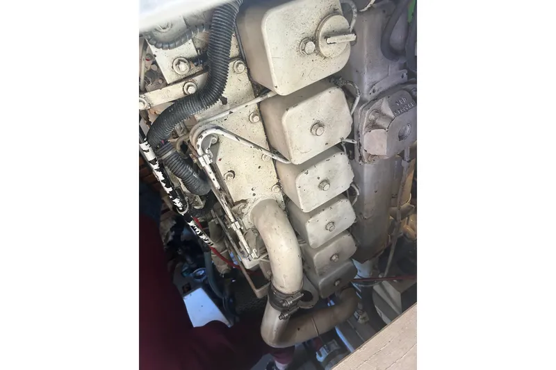 Slide: The Image of Engine of 1996 Grand Banks 36 Motoryacht, showcasing mechanical components and wiring. - 40