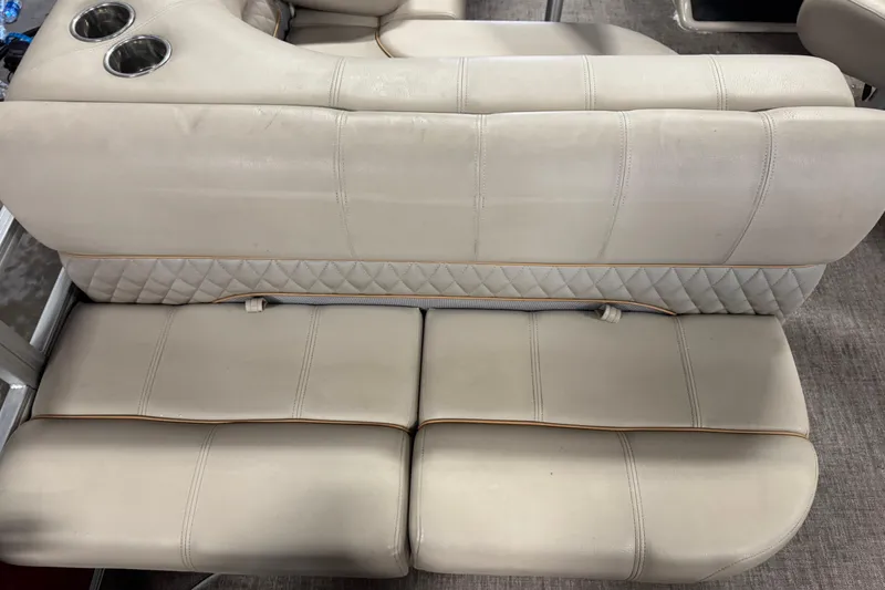 Slide: The Image of Beige leather seating with cup holders on a 2020 Ranger Reata 220F boat. - 20