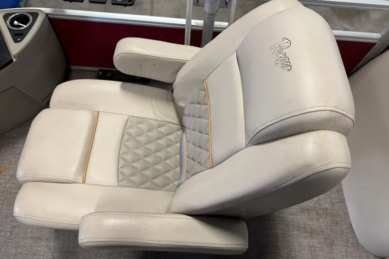 Slide: The Image of Luxurious beige captain's chair in 2020 Ranger Reata 220F boat. - 9