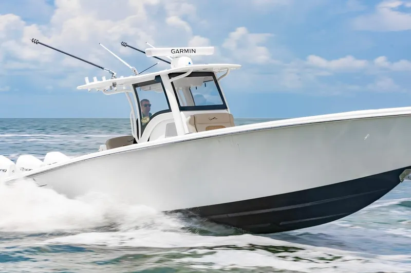 The Image of 2027 Blackwater 36 Sportfish boat cruising on open water under a clear sky. - 0