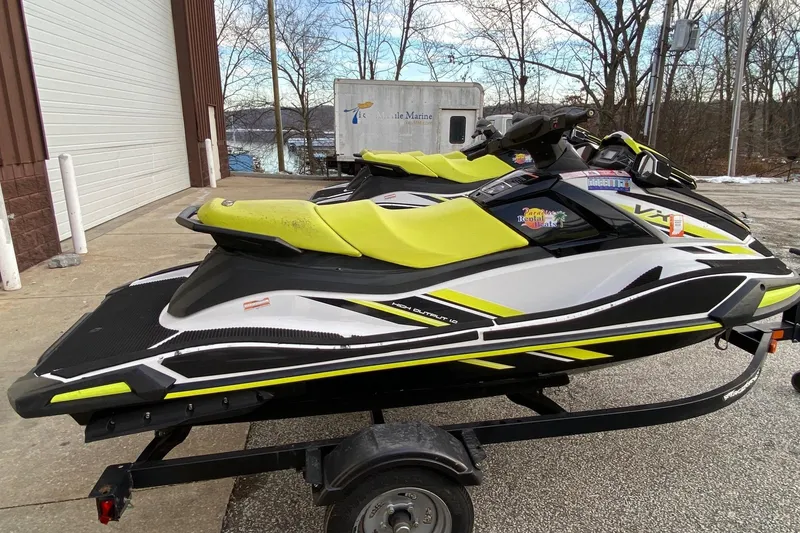 Slide: The Image of 2021 Yamaha WaveRunner VX jet ski with vibrant yellow accents on a trailer. - 1