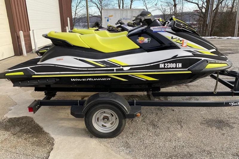 Slide: The Image of 2021 Yamaha WaveRunner VX on trailer, vibrant yellow and black design. - 12