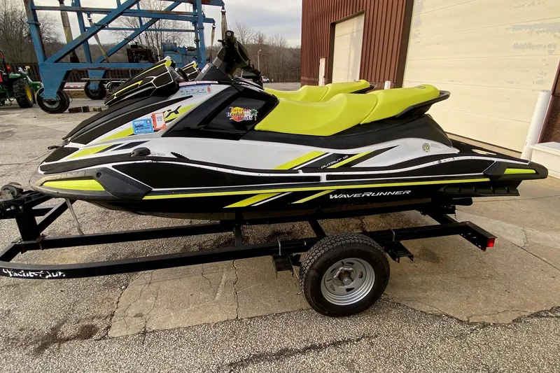Slide: The Image of 2021 Yamaha WaveRunner VX on trailer, featuring vibrant yellow and black design. - 5