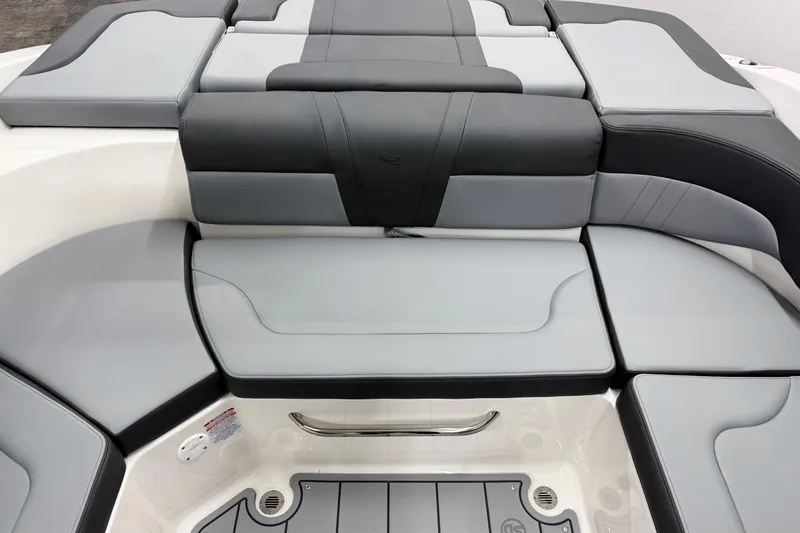 Slide: The Image of 2026 Chaparral 23 SSi boat interior with sleek, modern seating design. - 20