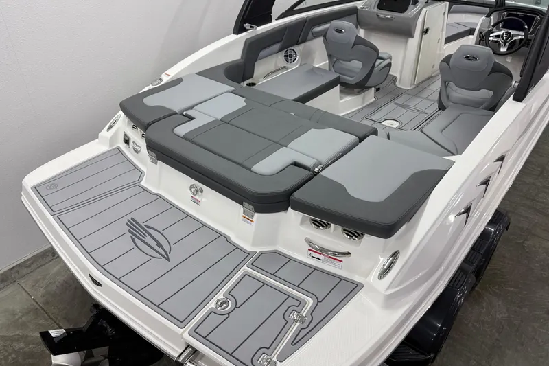 Slide: The Image of 2026 Chaparral 23 SSi boat interior with gray seating and modern design. - 4
