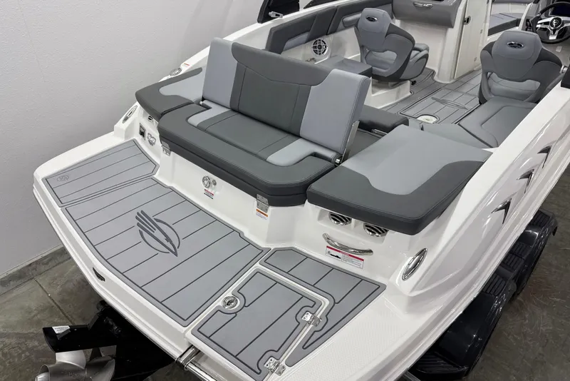 Slide: The Image of 2026 Chaparral 23 SSi boat interior with gray seating and deck design. - 5