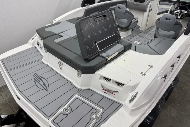 Slide: The Image of 2026 Chaparral 23 SSi boat interior with gray seating and deck, showcasing modern design. - 7