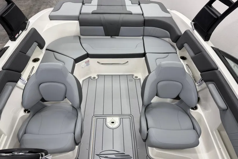 Slide: The Image of 2026 Chaparral 23 SSi boat interior with gray seating and modern design. - 8