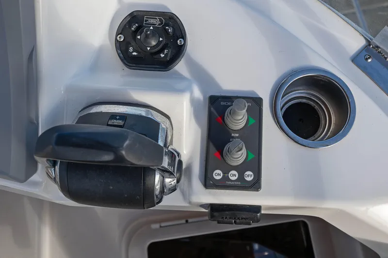 Slide: The Image of Control panel of 2014 Ranger Tug R-31 CB with throttle and joystick controls. - 19