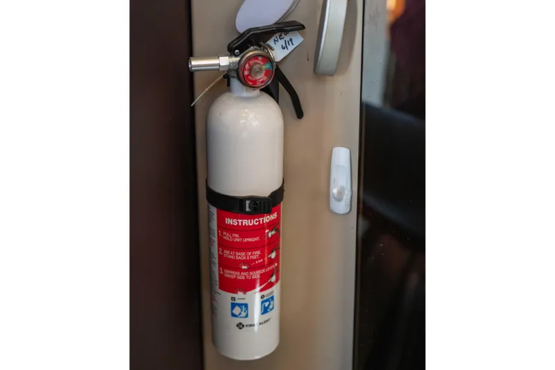 Slide: The Image of Fire extinguisher mounted on 2014 Ranger Tug R-31 CB boat interior. - 37