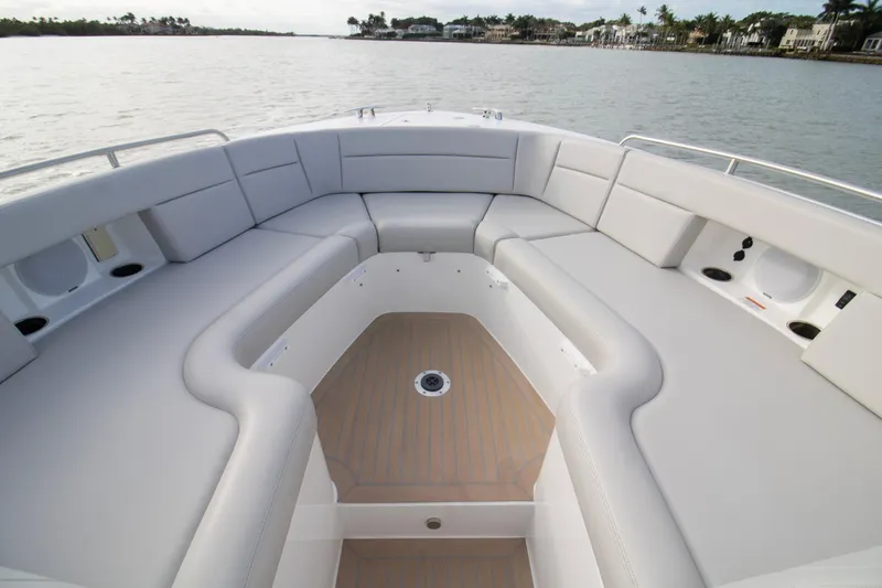 Slide: The Image of Luxurious interior of 2025 MJM 38 X yacht with plush seating and scenic water view. - 12