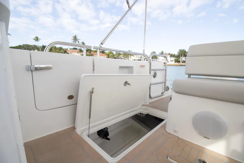 Slide: The Image of 2025 MJM 38 X yacht with open stainless steel drawer fridge on deck. - 25
