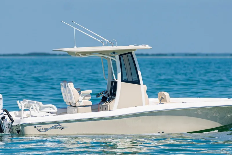 The Image of 2027 Blackwater 23 Bay Fish boat on calm blue water. - 1