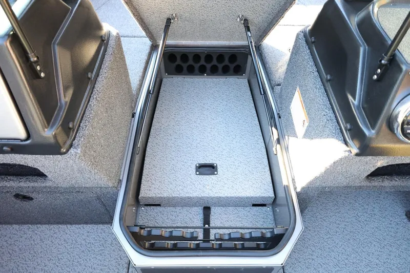 Slide: The Image of 2026 Lund 1775 Impact XS Sport boat interior storage compartment. - 25