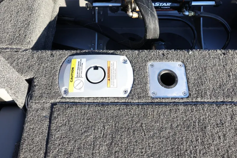 Slide: The Image of 2026 Lund 1775 Impact XS Sport boat interior with fuel cap and mount. - 41