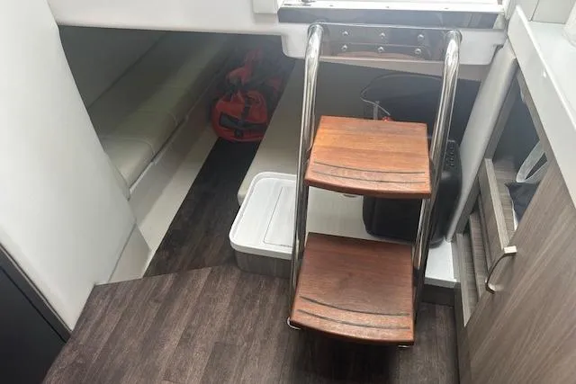 Slide: The Image of 2022 Regal 38 SAV interior with wooden steps and modern design elements. - 14