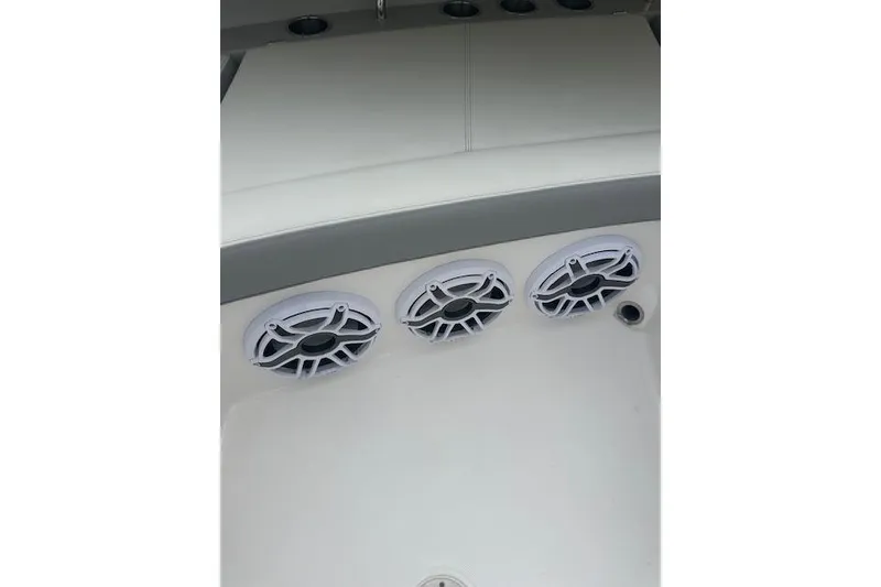 Slide: The Image of 2022 Regal 38 SAV boat interior with three built-in speakers. - 34