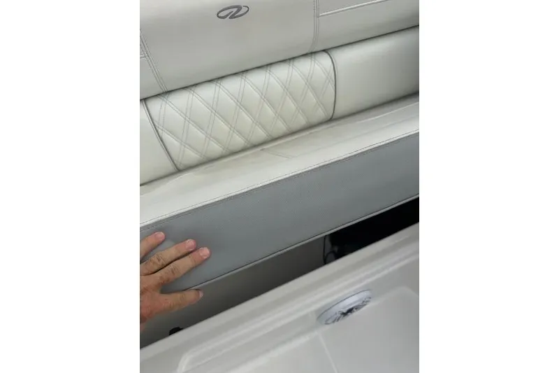 Slide: The Image of Luxurious seating detail on 2022 Regal 38 SAV boat with diamond stitching. - 35
