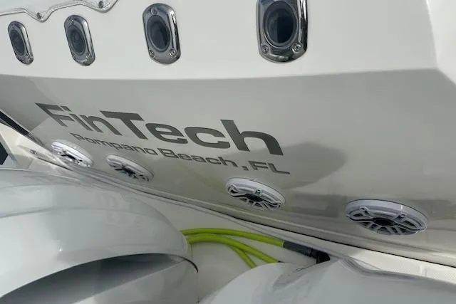 Slide: The Image of 2022 Regal 38 SAV boat with "FinTech" branding, Pompano Beach, FL. - 43