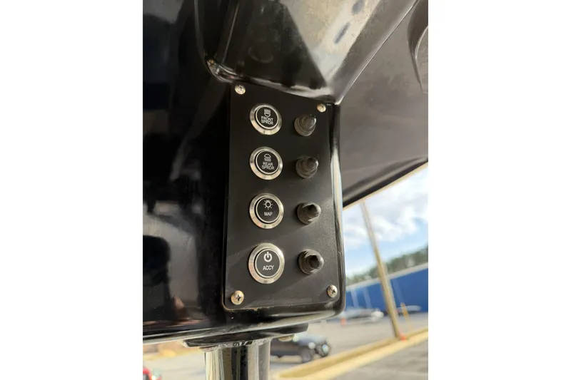 Slide: The Image of Control panel of 2024 Sea Born SX239 Offshore boat with labeled buttons. - 12