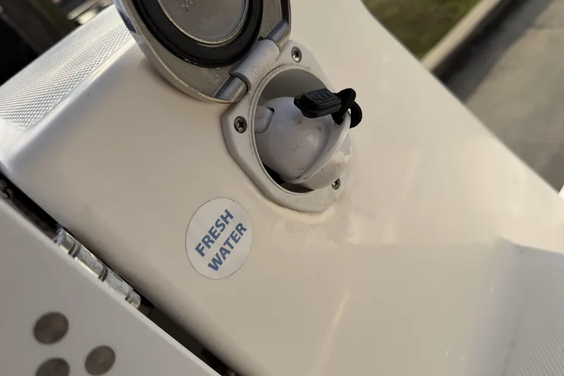 Slide: The Image of 2024 Sea Born SX239 Offshore boat's fresh water inlet detail. - 33