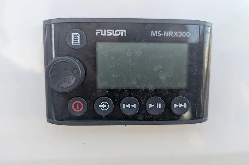 Slide: The Image of Fusion MS-NRX300 marine stereo remote on a 2021 Sea Ray SDX 270 Outboard. - 25